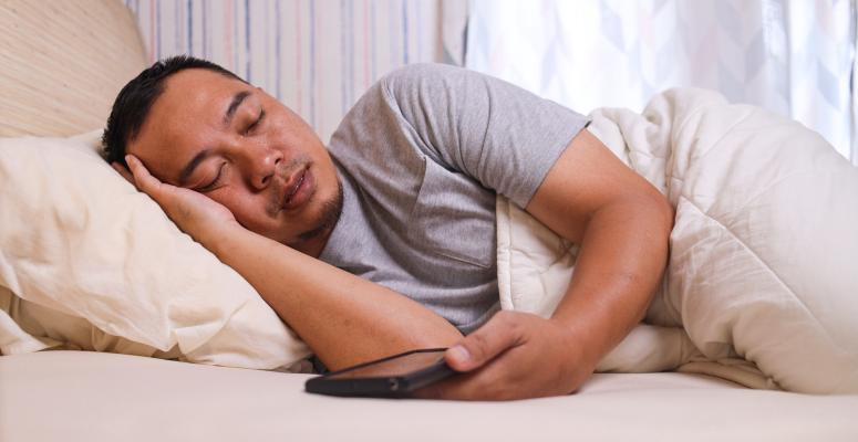 https://www.allianceptp.com/sites/default/files/styles/775x400/public/2023-06/asian-man-sleeping-spread-out-in-bed-with-his-smar-2023-05-19-23-29-51-utc.jpg?itok=UX75aYxt