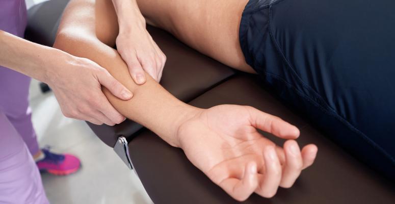 man receiving physical therapy massage