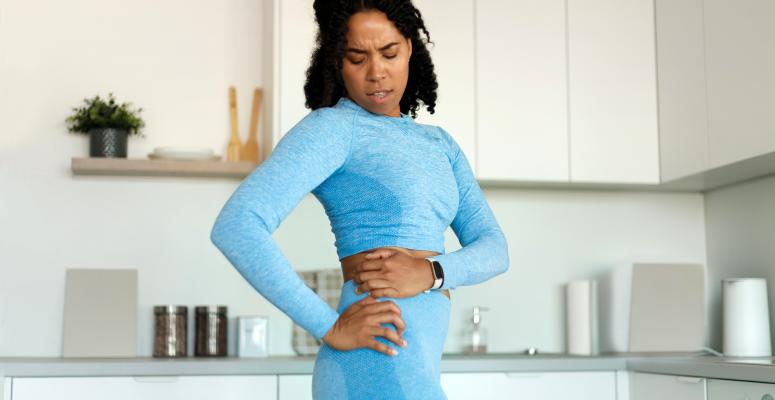 woman experiencing hip pain due to bursitis