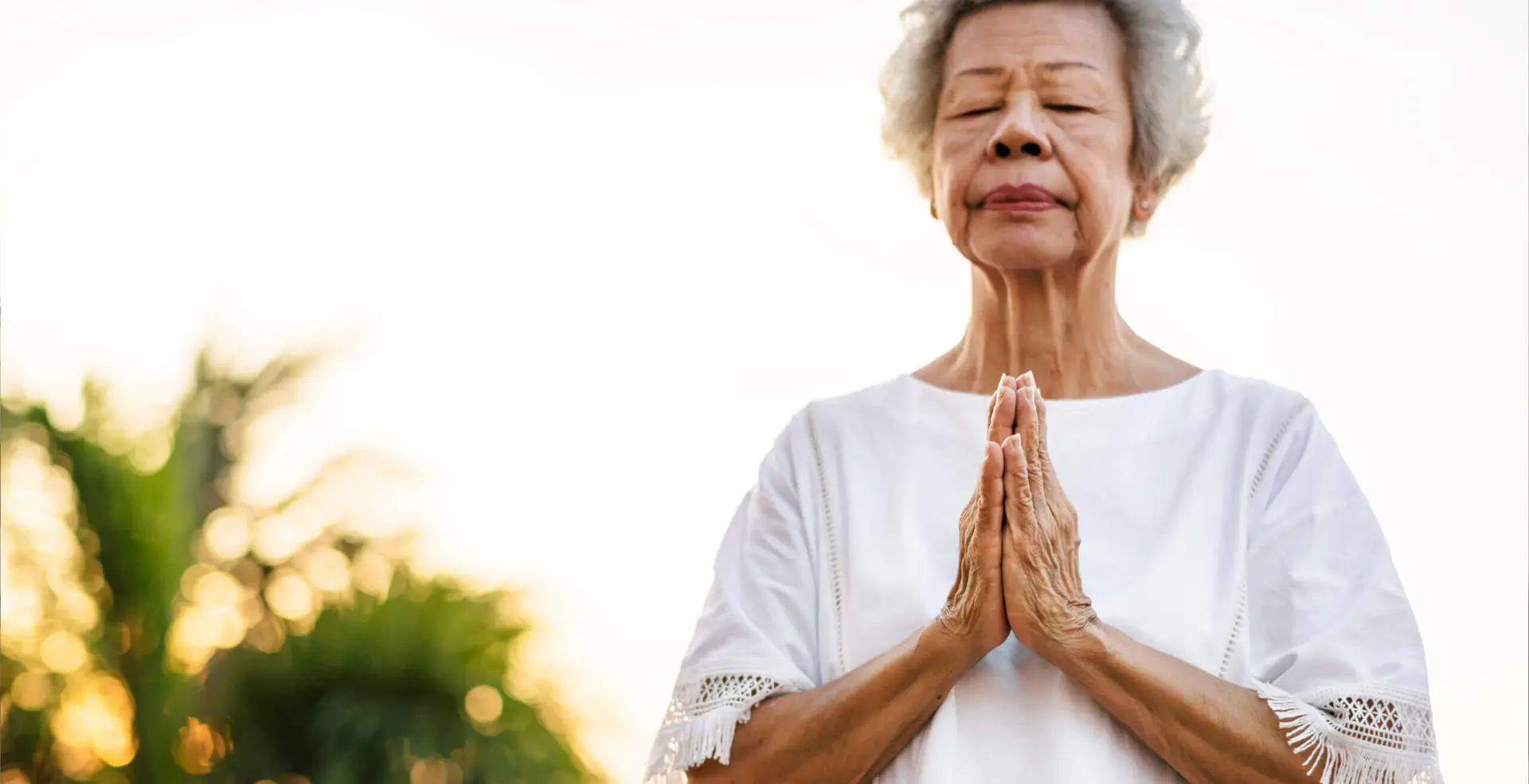 COVID-19/Respiratory Recovery senior woman practicing yoga in the morning HPMKBDQ Cropped scaled 1 covid-19/respiratory recovery uncategorized